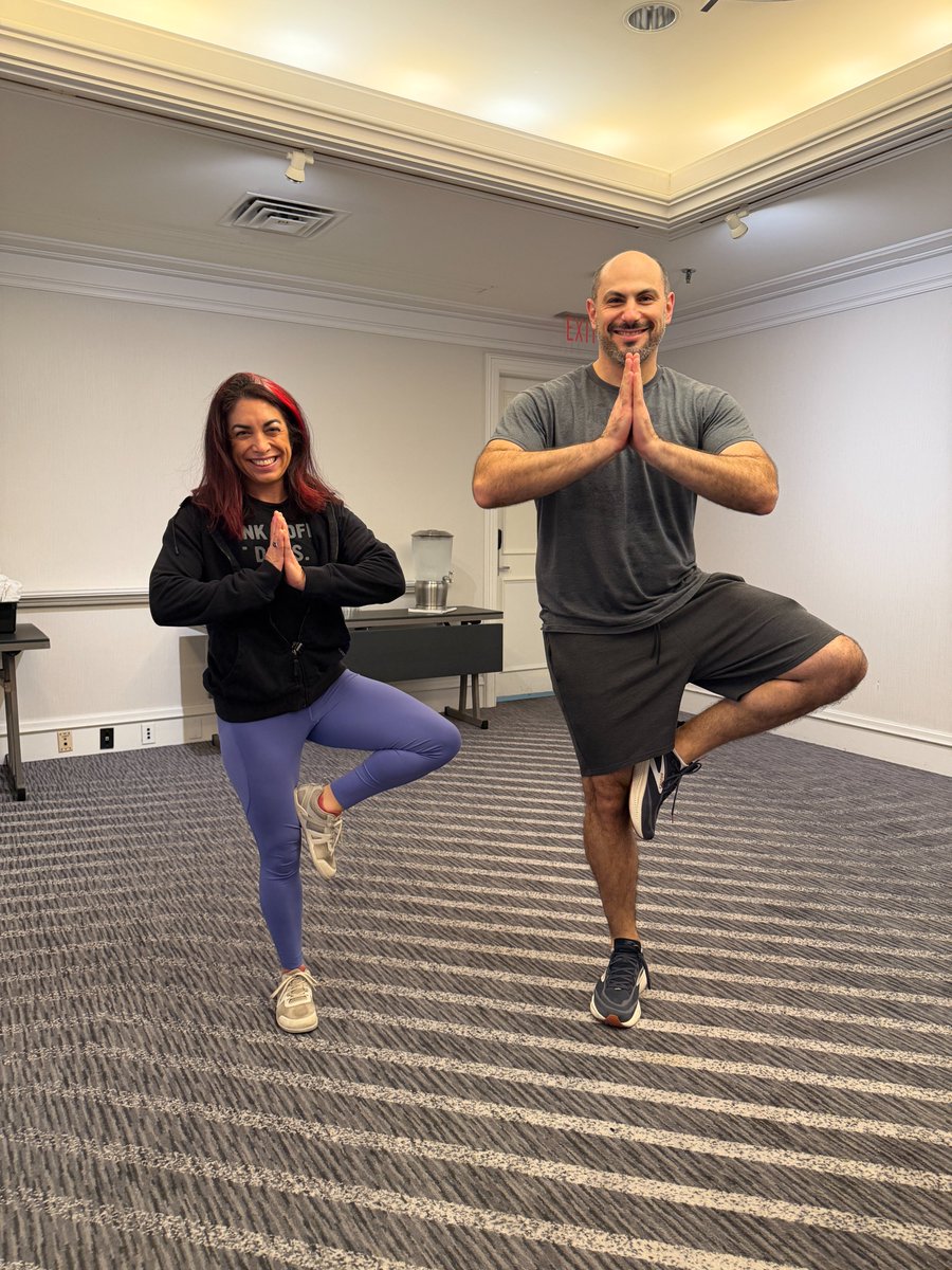 Neurohosp's tweet photo. Namaste-ing ready for Day 2 🧘 

Thanks to Dr. Jamie Lee Palaganas and Dr. Doug Pet for getting us moving this morning! 

#Neurohospitalist #NHS2026 https://t.co/OQBhmIs7r1