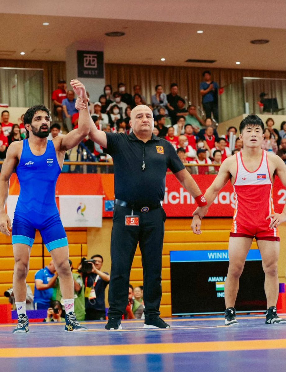AshwiniVaishnaw's tweet photo. Golden glory on the mat! 🤼🥇🇮🇳

Aman Sehrawat wins Gold in the Men’s 57kg Freestyle Wrestling event at the #AsianGames2026 https://t.co/FtWBBw5KsJ