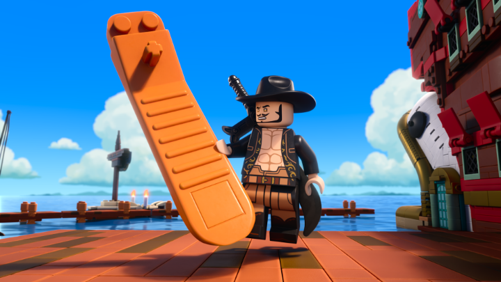 A LEGO minifigure pirate wearing a black cowboy hat and coat wields an oversized orange rectangular piece (resembling a coffin or plank) instead of a traditional weapon, standing on a dock near a ship and harbor buildings. The image humorously relates to the post's joke about the character pulling out a "bucket of black paint," since his all-black outfit makes him look like he could have.