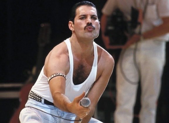historyinmemes's tweet photo. Just before Live Aid in 1985, Freddie Mercury was reportedly warned by his doctor not to perform because he was experiencing vocal problems. Mercury chose to take the risk anyway, stepping onto the stage with Queen at London’s Wembley Stadium.

For roughly 21 unforgettable minutes, Queen captivated the enormous crowd. Mercury’s commanding vocals, effortless confidence, and legendary stage presence transformed the performance into one of the defining moments of the historic concert. Years later, a BBC poll named it the greatest rock gig of all time.

More than four decades later, Queen’s Live Aid set remains an iconic moment in music history and a powerful example of Freddie Mercury’s extraordinary ability to command a stadium.