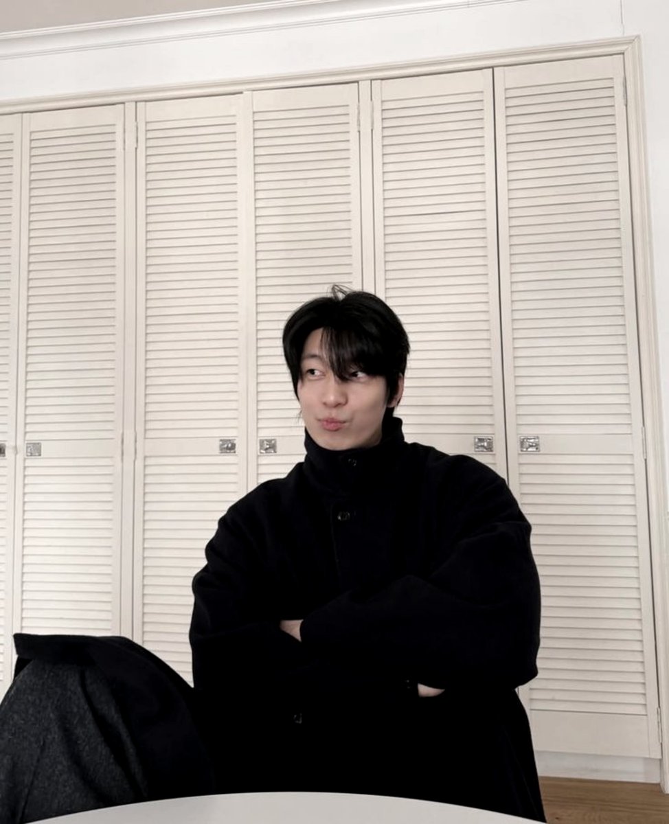 Wihajoonx's tweet photo. Just a man in all black, but with a sweet smile. https://t.co/Q01sc9PoKr