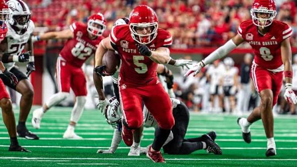 LandonB2028's tweet photo. Very grateful and excited to be attending the South Dakota vs Indiana State game today. Thank you to @Thompson22Mason for the invite! Super pumped to tour the facility, develop relationships, and watch Coyote football!!! 

@coachcdantew @SeanConsidine37 @byronhsad @SDCoyotesFB https://t.co/oEctdKWqrd