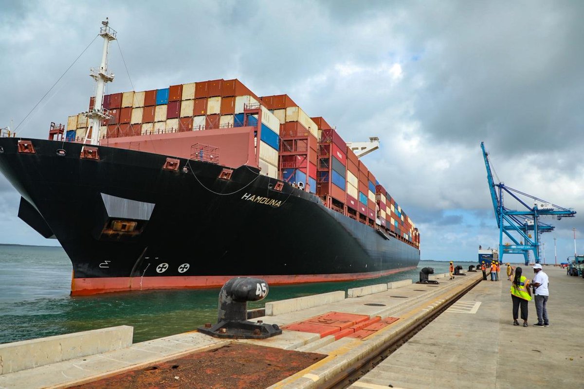 Kenya_Ports's tweet photo. The Port of Lamu on Saturday recorded another significant milestone after welcoming MV Hamouna, a massive container vessel measuring 366 metres in length overall (LOA), further underscoring the port’s deep-water capability and its growing role as a transshipment and regional trade hub along the LAPSSET Corridor.

Apart from its impressive size, MV Hamouna arrived carrying approximately 14,500 TEUs, with about 5,200 TEUs scheduled for discharge at Lamu Port. The containers will subsequently be transshipped to various destinations by smaller feeder vessels.

Speaking after the successful berthing of MV Hamouna, which navigated approximately 14 nautical miles through the Eastern Channel, Kenya Ports Authority PLC Managing Director Captain William Ruto said the vessel’s arrival further demonstrated Lamu’s growing dominance as a strategic regional maritime hub.

“This is the first vessel to discharge over 5,000 TEUs at once. Even our Mombasa Port has not surpassed this figure, making Lamu Port the next frontier in the maritime industry,” said Captain Ruto.

With the groundbreaking ceremony for the construction of the Dangote East Africa Refinery Capt. Ruto added that the project would further boost port operations and create additional opportunities for maritime and logistics services in the region.

The Port of Lamu’s ability to accommodate some of the world’s largest vessels is supported by its deep-water harbour and modern berthing infrastructure. Its berths have a depth of approximately 17.5 metres, providing sufficient draught for large vessels.

MV Hamouna is among the largest vessels to call at Lamu this year. Earlier, MV Baltimore Express, a 369-metre container vessel operated by German shipping line Hapag-Lloyd, called at the port.

In August 2025, another Hapag-Lloyd vessel, MV Nagoya Express, measuring 335 metres, set a previous vessel-size record at the Port of Lamu.

As part of the traditional maiden-call ceremony, Captain Ruto presented a certificate of first call and a plaque to the vessel’s master, Captain M. Firoozi.
