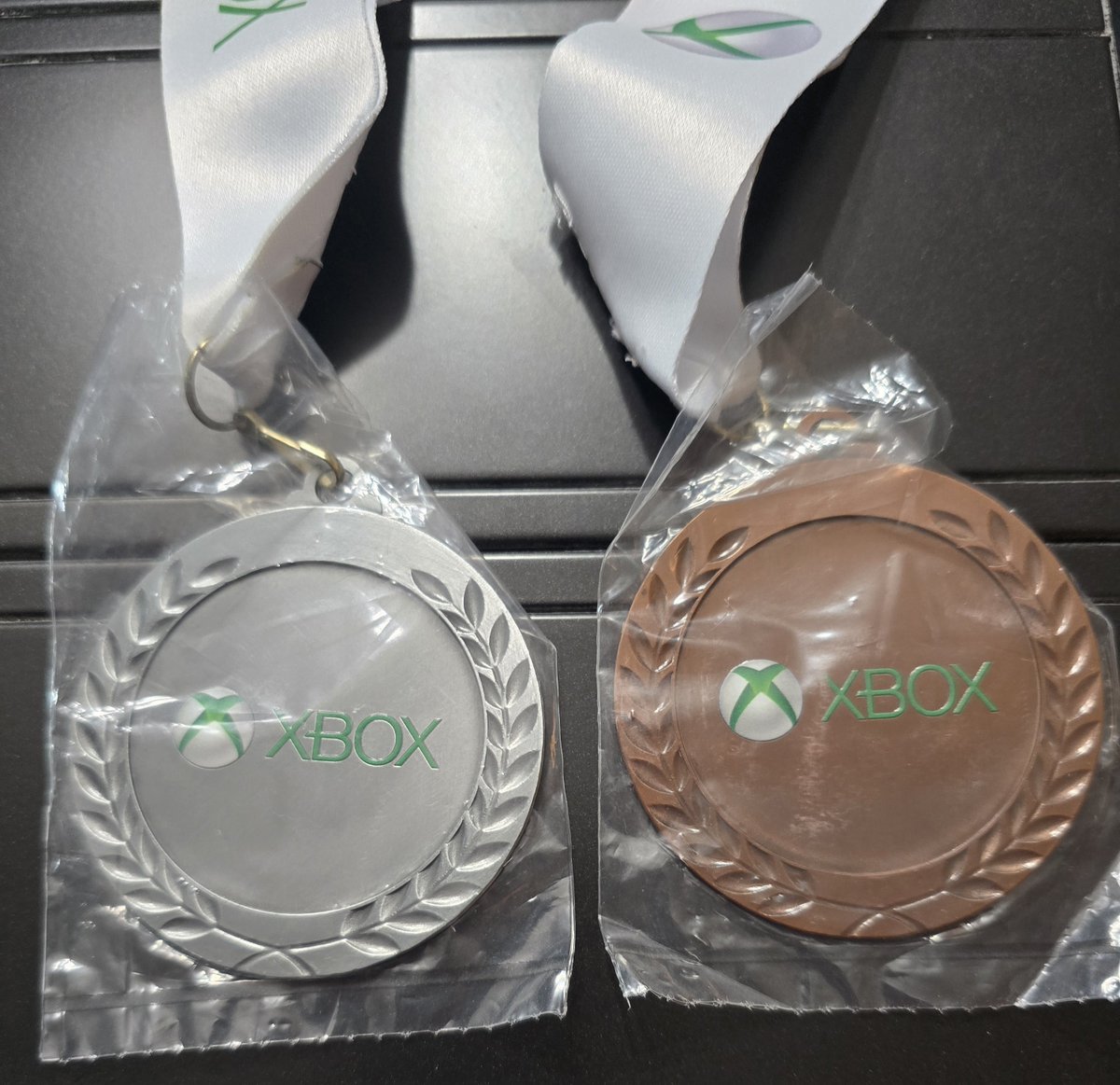 ImOGXboxGamer's tweet photo. Have some very special items to share today. Only internal Microsoft Management usually know about or have. Defenders of Joy medals 🏅 
#xbox #ogx #ogxboxgamer https://t.co/LiWHOfk2Vr