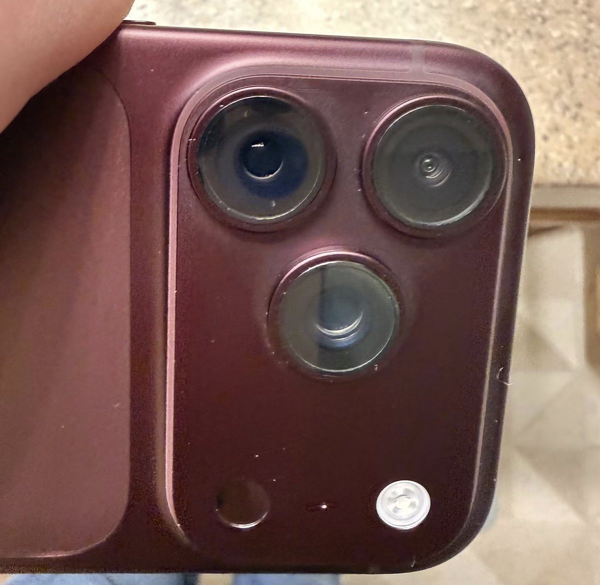 unespc's tweet photo. Paid $1,199 for an iPhone 18 Pro and the camera already looks like it's been through a war

The color around the lenses is literally fading. it doesn't wipe off. Apple pls 🙄
#iphone18pro https://t.co/u5j5jIgfyT
