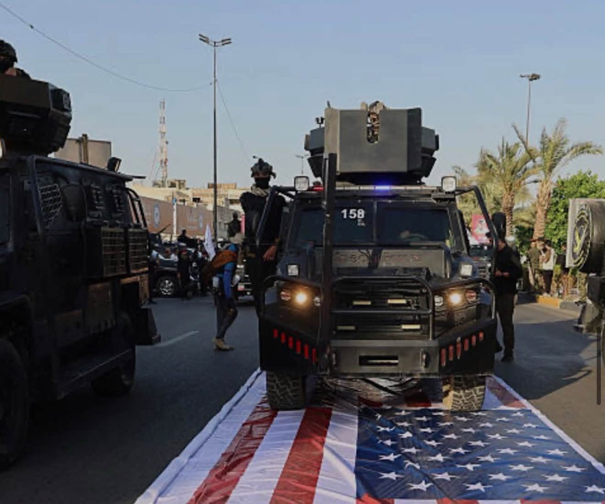 VictoriaT_'s tweet photo. When Iraq declared "Sovereignty Days" to celebrate the departure of US troops and end of Operation Inherent Resolve, I winced. The OIR mission was present in Iraq at the request of the Iraqi government to fight ISIS. 

I just knew there would eventually be some event where people were walking or driving over the flag and here it is. This time by the Popular Mobilization Forces, not just the militias. I know this doesn't represent all Iraqis, but the Iraqi government should have done better in avoiding this kind of blatant anti-Americanism from the official forces.