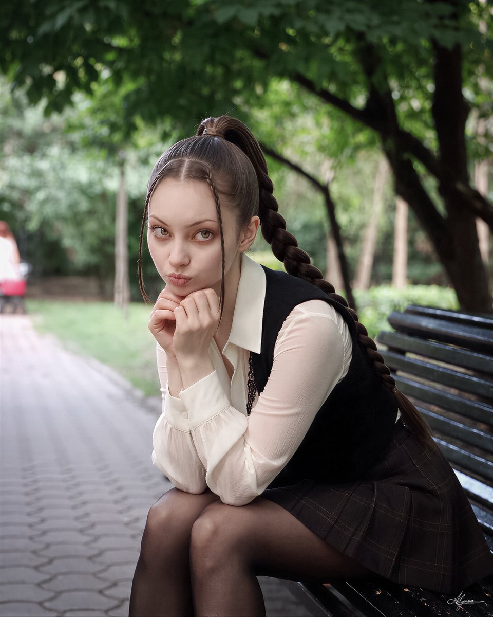 alynnaai's tweet photo. 🔸🔶 A Little Longer 🔶🔸

In Ioanid Park, Bucharest, the girl feels no need to hurry. She lingers beneath the trees, content with the shade and the small pleasure of having nowhere else to be. A little playfulness surfaces, then gives way to a tender wistfulness—the kind a lovely afternoon can bring when she wishes it would last a little longer.