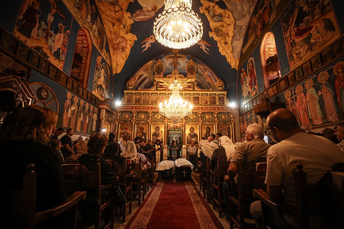 alijadallah66's tweet photo. Poeple gather during the funeral ceremony for two Palestinian Christian women at the St. Porphyrios Greek Orthodox Church in Gaza City, Palestine on October 03, 2026. Meysa Hidir Ibrahim Abu Dawud and her daughter Marya Hafiz Michel Najjar were killed after an Israeli airstrike. (Photo by Ali Jadallah/Anadolu via Getty Images)