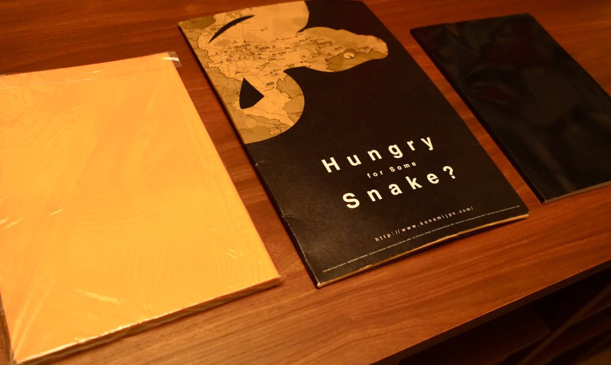 HIDEO_KOJIMA_EN's tweet photo. I found these in my storage: the booklet included with the MGS2 limited edition, the MGS3 pamphlet we handed out at E3, and the booklet included with the ANUBIS limited edition. Back when we used to make everything in-house. The early visual concept for MGS3 was designed by Kyle. Harry was born in 1961, Kyle in 1962, I was born in 1963, and MGS3 is set in 1964.