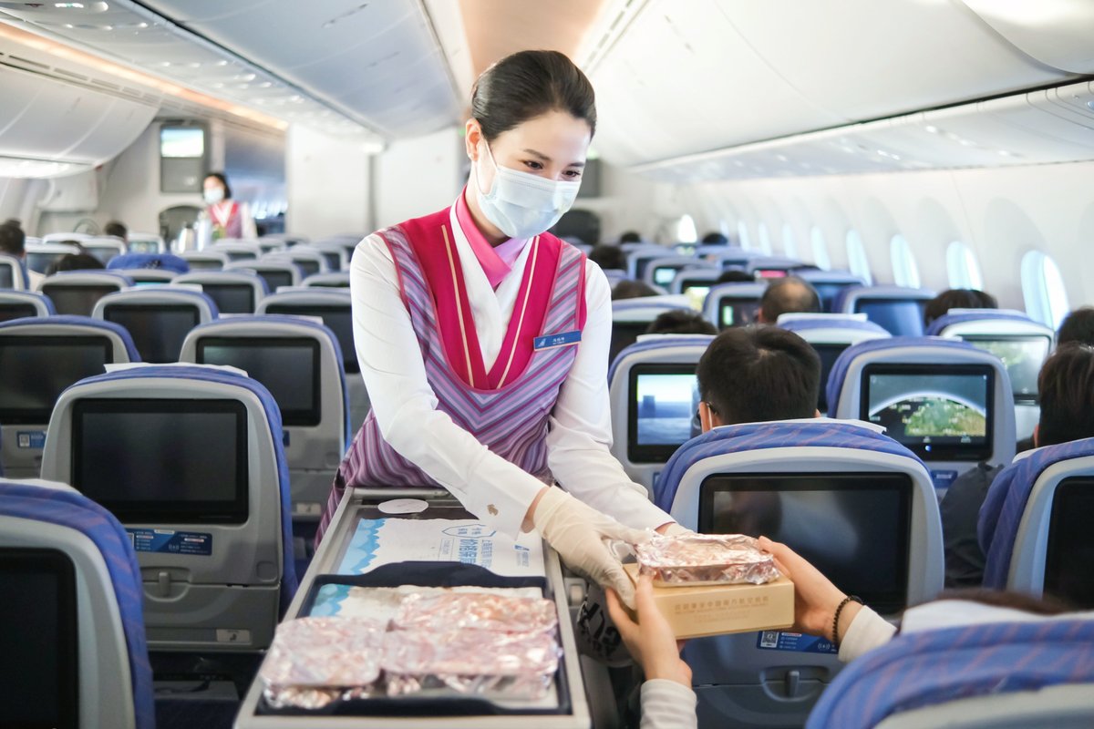 TraceFable2cur's tweet photo. The cabin crew member stood proud, with a timid yet charming attendant beside him. https://t.co/lKrOsaaV1H