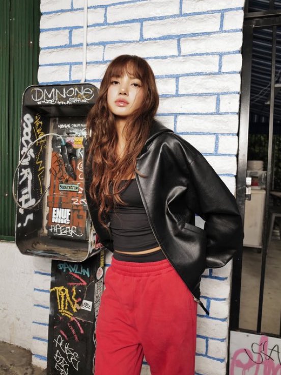 popbuzzz_'s tweet photo. BLACKPINK’s Lisa modeling her LLOUD brand’s capsule collection with Von Dutch Hollywood, featuring trucker caps and zip-up hoodies in black, navy, and pink.

The collaboration, Von Dutch Hollywood’s first-ever, debuts exclusively at ComplexCon in Los Angeles on October 3-4, 2026, with items like tees, hoodies, and accessories.

Lisa looking cool in casual streetwear looks with the brands’ logos, blending K-pop influence and retro California aesthetics against urban and nature backdrops.