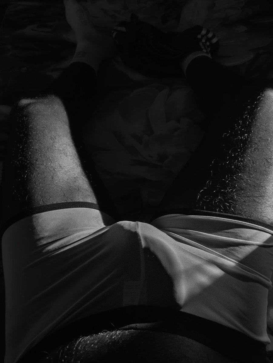 KevinPeterpvlh's tweet photo. Low light, high contrast, and these sheer briefs doing absolutely nothing to hide what’s underneath. Thighs open, arms up, tag still on. Come closer.

#sensual #monochrome #sheer #lowlight #bodypositivity https://t.co/OTUH8yCVtf