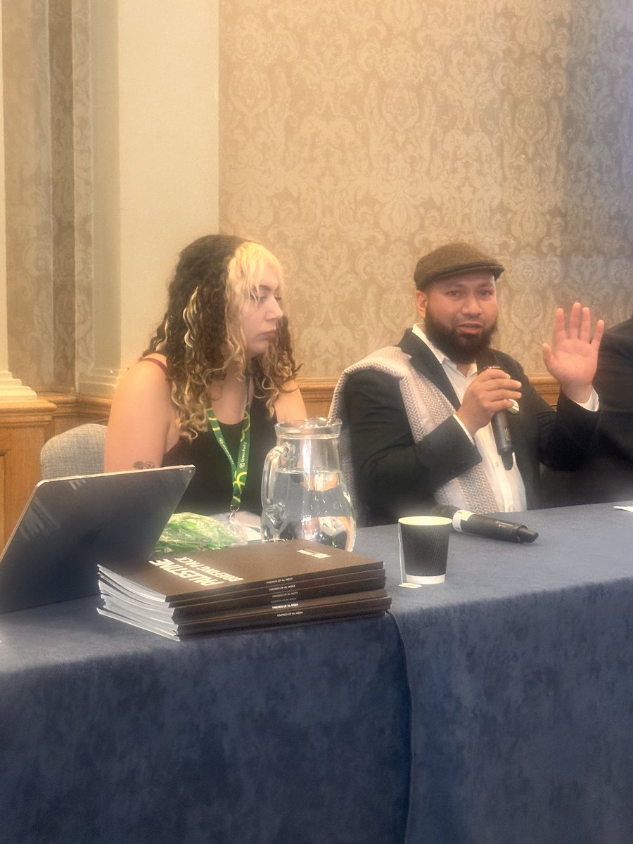 lmharpin's tweet photo. Multiple sources at Green Party conference claim Mothin Ali planning to exploit split over Zionism-racism motion to topple Zack Polanski. The deputy leader confirms his support for the racist motion. Asked by the BBC about leadership ambitions he claims “Zack’s my leader, and he has my full support.”