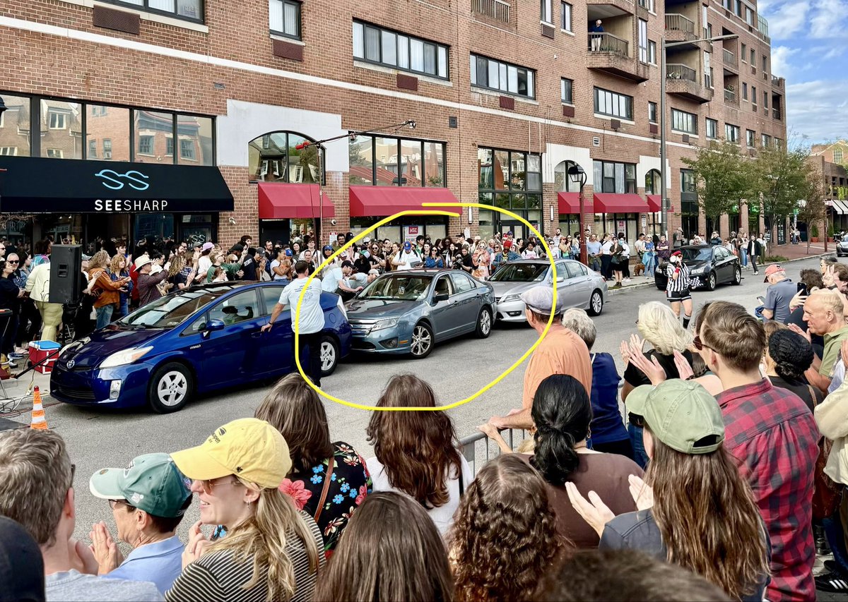EricBalchunas's tweet photo. Fun scene down at the 1st ann Philly parallel parking competition. It’s no joke for the drivers tho, super tight spot, only 18 inches of space. Lots of oohs and aahs from crowd. https://t.co/qBGYMDSKMR