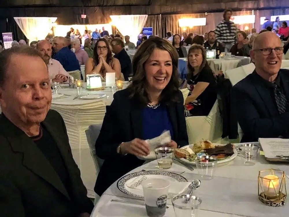 albertaNDP's tweet photo. Danielle Smith gave the separatists everything they wanted. Did she know her separatist friends were trying to give the U.S. the resources that belong to all Albertans? Mitch Sylvestre is pictured to the right of Smith and remains the president of the Bonnyville-Cold Lake-St. Paul United Conservative Party (UCP) constituency association.
Danielle’s own party members were conspiring with Americans and selling Albertans out to become the 51st state, behind closed doors. When will Danielle do what’s best for the province and the country and kick them out of the UCP?