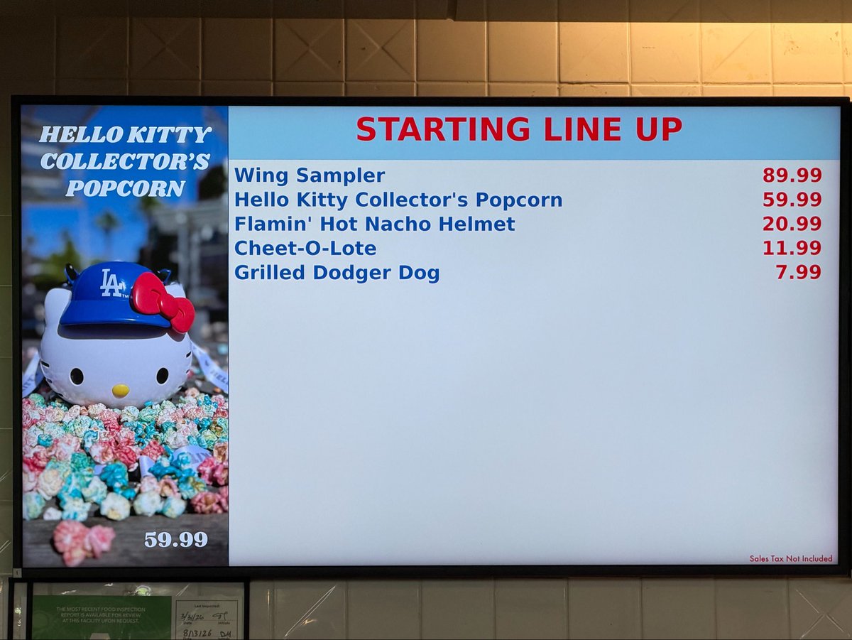 ArashMarkazi's tweet photo. Some of the meal deals at Dodger Stadium: 

Wing Sampler: $89.99
Hello Kitty Collector’s Popcorn: $59.99
Hot Dog Combo: $59.99
Nacho Combo: $34.99 https://t.co/ms5CDsuWgY