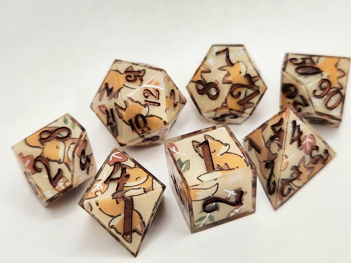 Sinnamon_Dice's tweet photo. Fall Foxes Dice Set with Copper Numbering 🍂
#dnd #ttrpg #handmadedice #dice #dungeonsanddragons https://t.co/0Il27gsIQI
