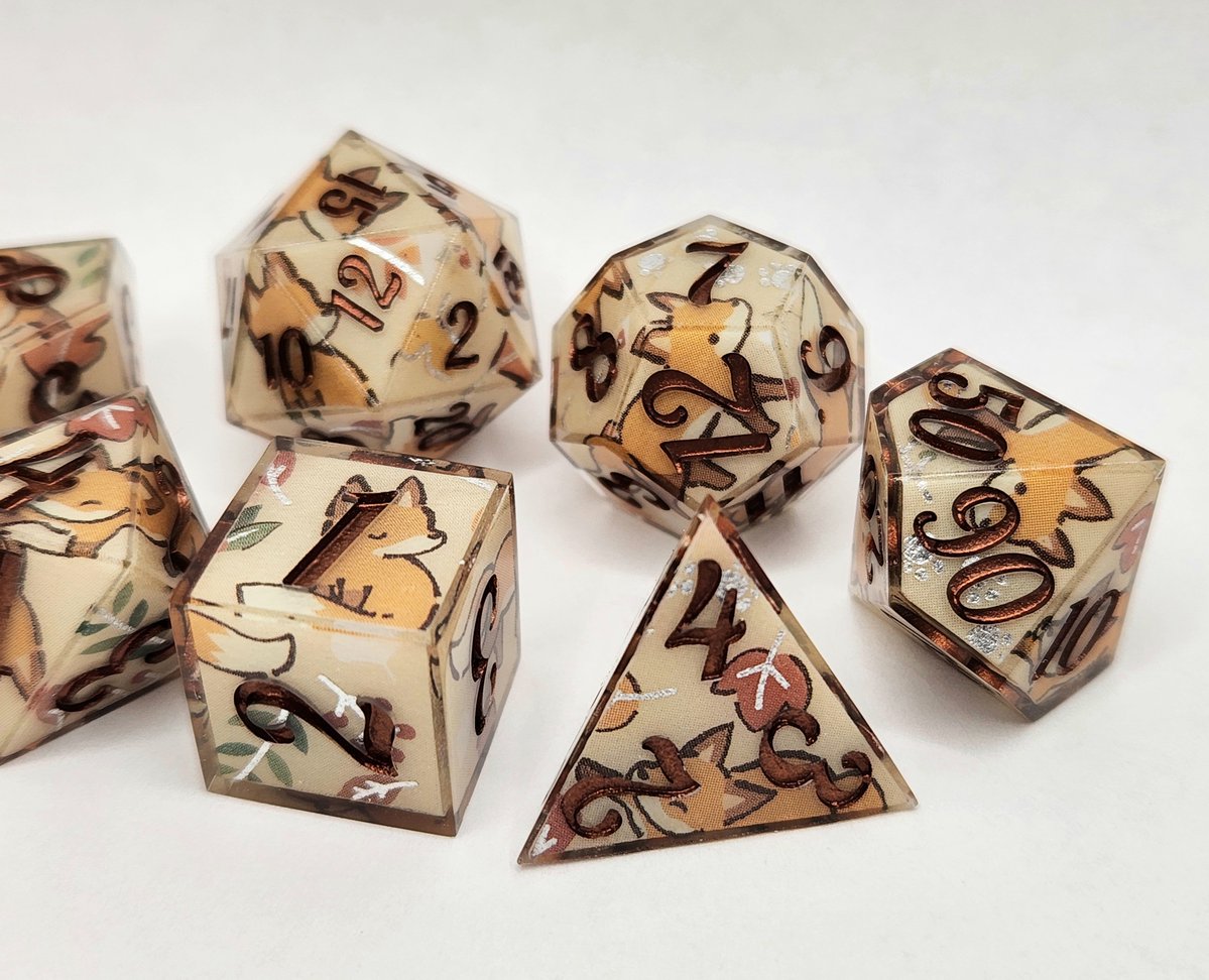 Sinnamon_Dice's tweet photo. Fall Foxes Dice Set with Copper Numbering 🍂
#dnd #ttrpg #handmadedice #dice #dungeonsanddragons https://t.co/0Il27gsIQI