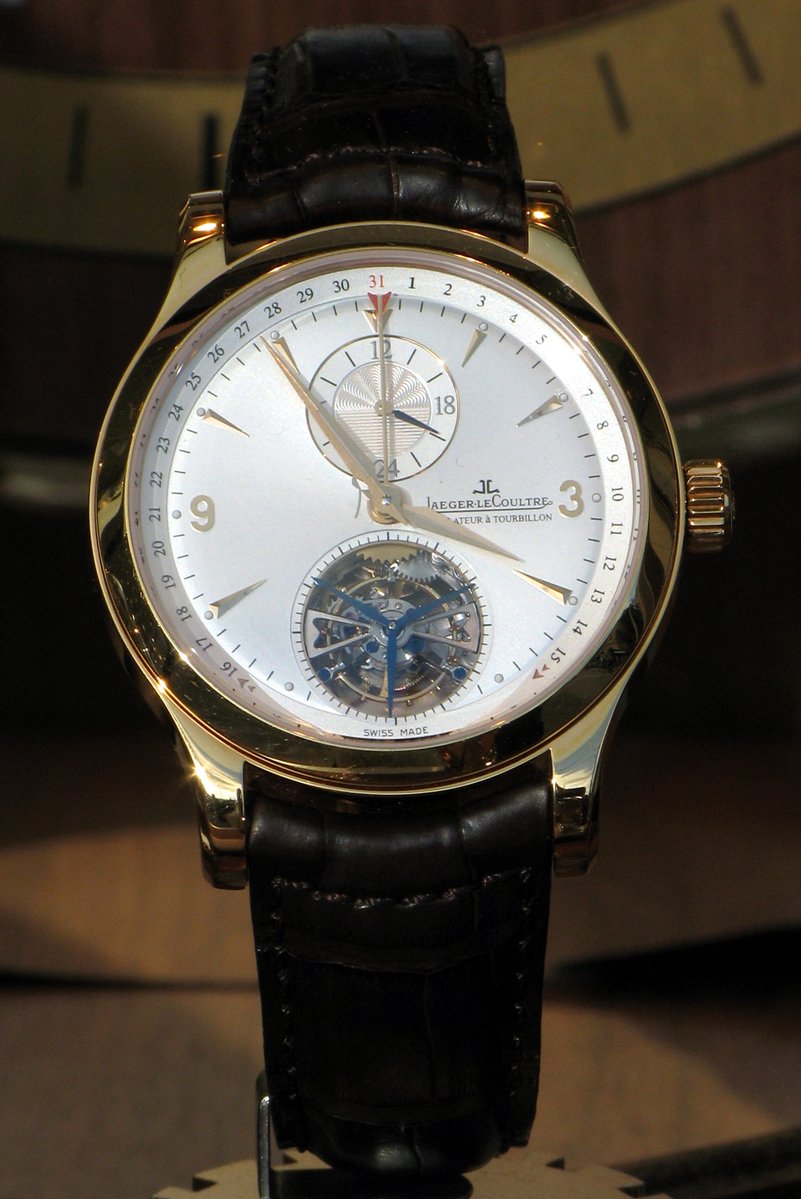 InsideAWatch's tweet photo. That cage at 6 is a tourbillon. Breguet patented it in 1801. Pocket watches sat upright in a vest pocket all day, gravity dragging the balance the same way, so he put the escapement in a cage that spins once a minute and averages the error out. Photo: Rama via Wikimedia Commons https://t.co/Kv552q980j