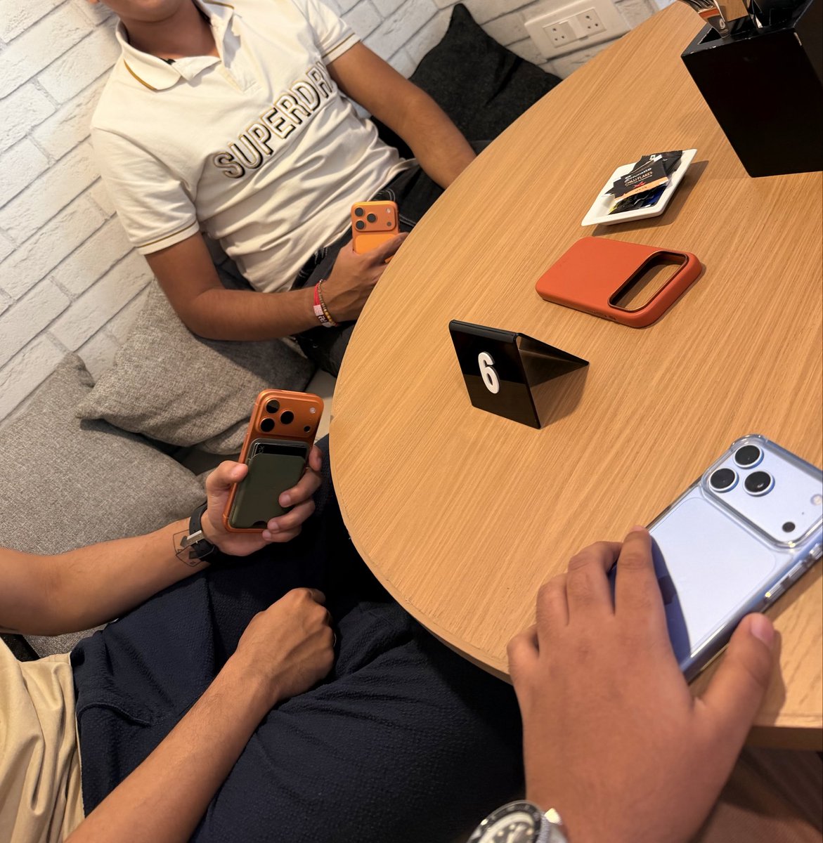 mrtechsense's tweet photo. Imagine still pulling out an ORANGE iPhone in October 2026 😭 https://t.co/ZS29yTXfOj
