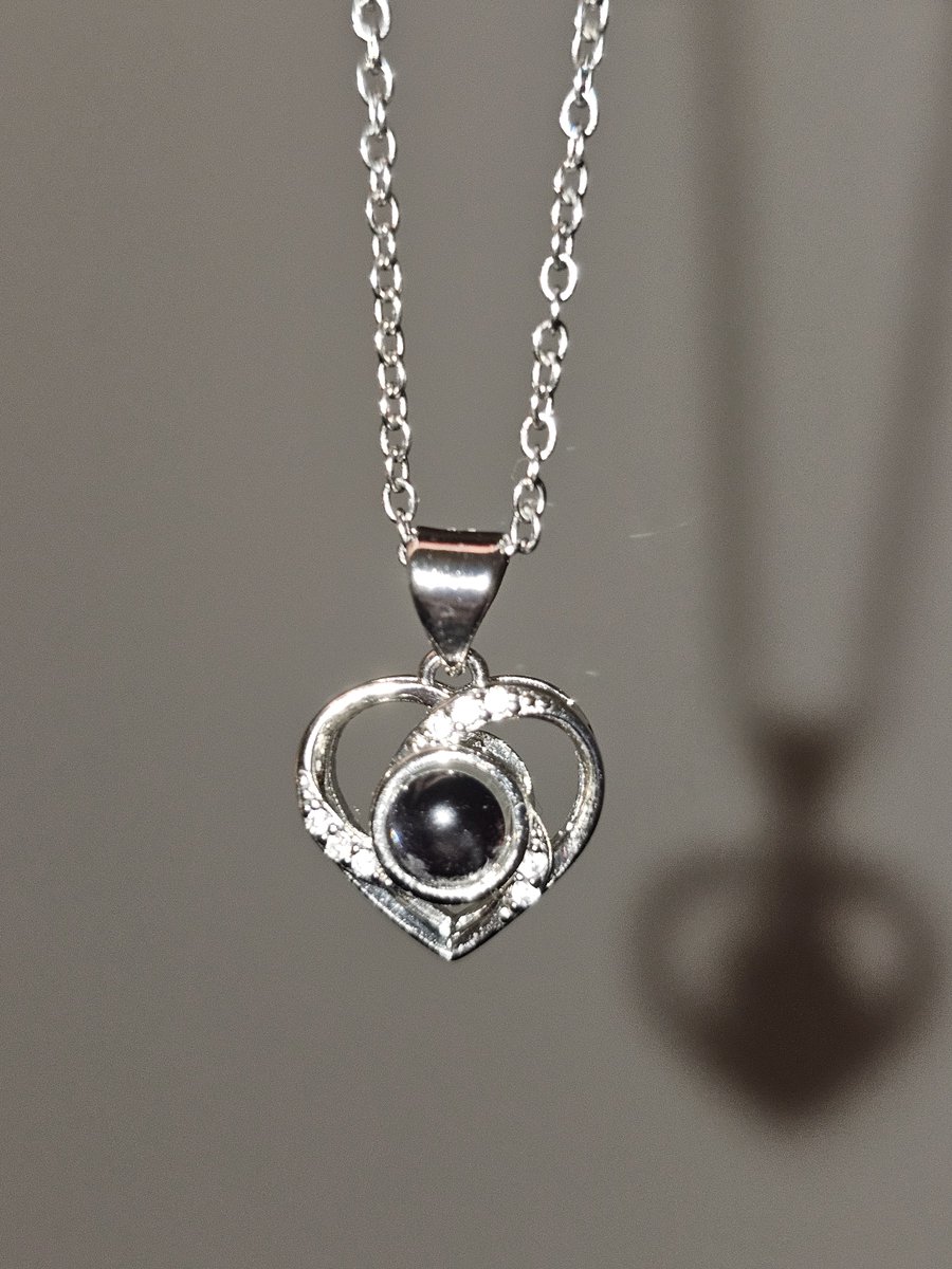 losinggteeth's tweet photo. bf got me a gorgeous necklace for our anniversary with a picture of bob mortimer in his wotsit wig in it!! thats true love https://t.co/msn5xjK15J