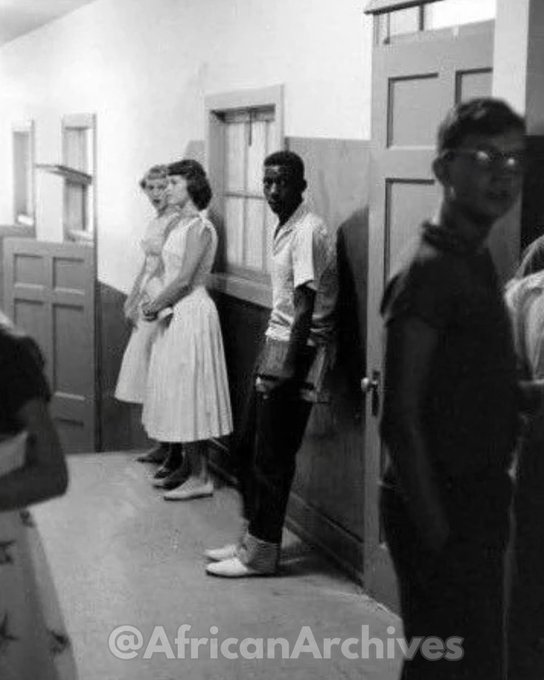 AfricanArchives's tweet photo. A lone Black student waits for class to start at a newly integrated high school in Clinton, Tennessee, 1956. https://t.co/S0d92iIwLX