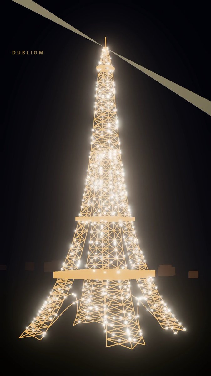 A digital illustration of the Eiffel Tower illuminated against a dark night sky, with the text 'DUBLIOM' visible in the upper left corner and a beam of light crossing the scene.
