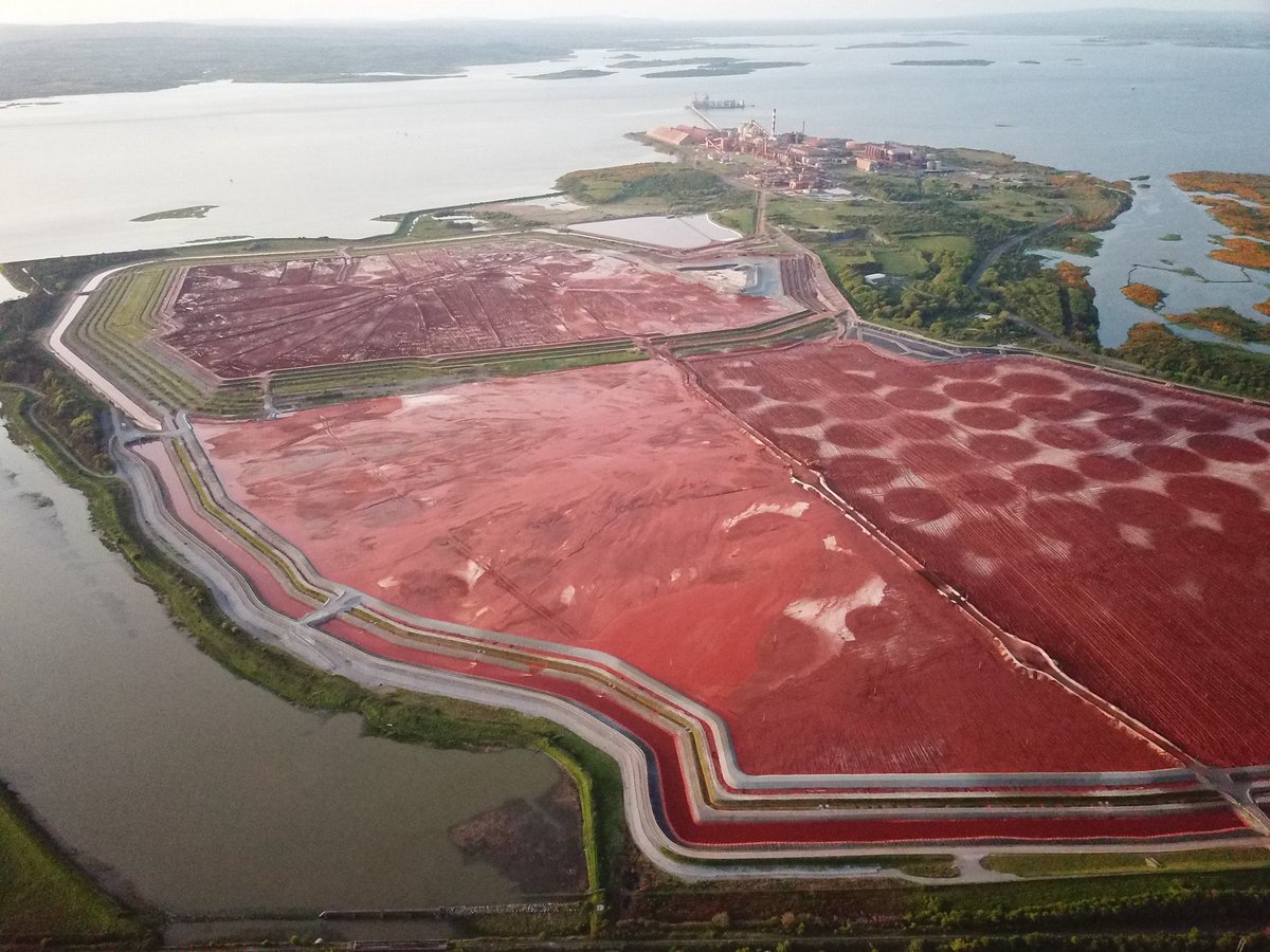 realLangerDan's tweet photo. ‼️The Irish Government secured an agreement from Rusal and Aughinish Alumina Ltd earlier this year to place €31 million into an escrow account to help with the clean-up costs of Aughinish post closure. 

The problem? 

There is a 450 acre, 50 million tonne caustic waste dump on-site containing the bye-product waste of producing alumina. 

The escrowed money equates to €0.62c per tonne. 

The #Alumina22 campaign understands that the cheapest containment option to deal with this red mud waste, will cost approx €20 a tonne post closure. At 50 million tons, that’s a fee of €1 Billion. 

I repeat. There’s €31 Million in the escrow account. The Irish taxpayer is therefore liable, at best, and assuming no damage to the estuary, €969,000,000 in clean-up costs. 

Some may say, if you deal with russia: FAFO.