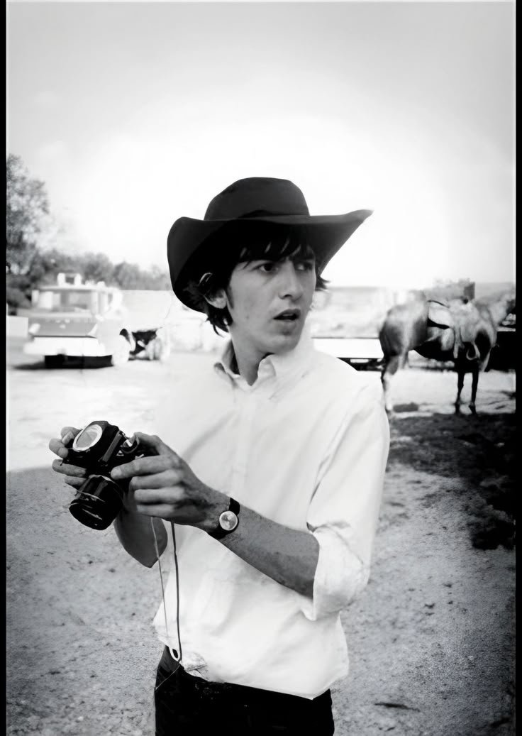 elininthe60s's tweet photo. George Harrison and Cameras https://t.co/eWs0zTSo9H