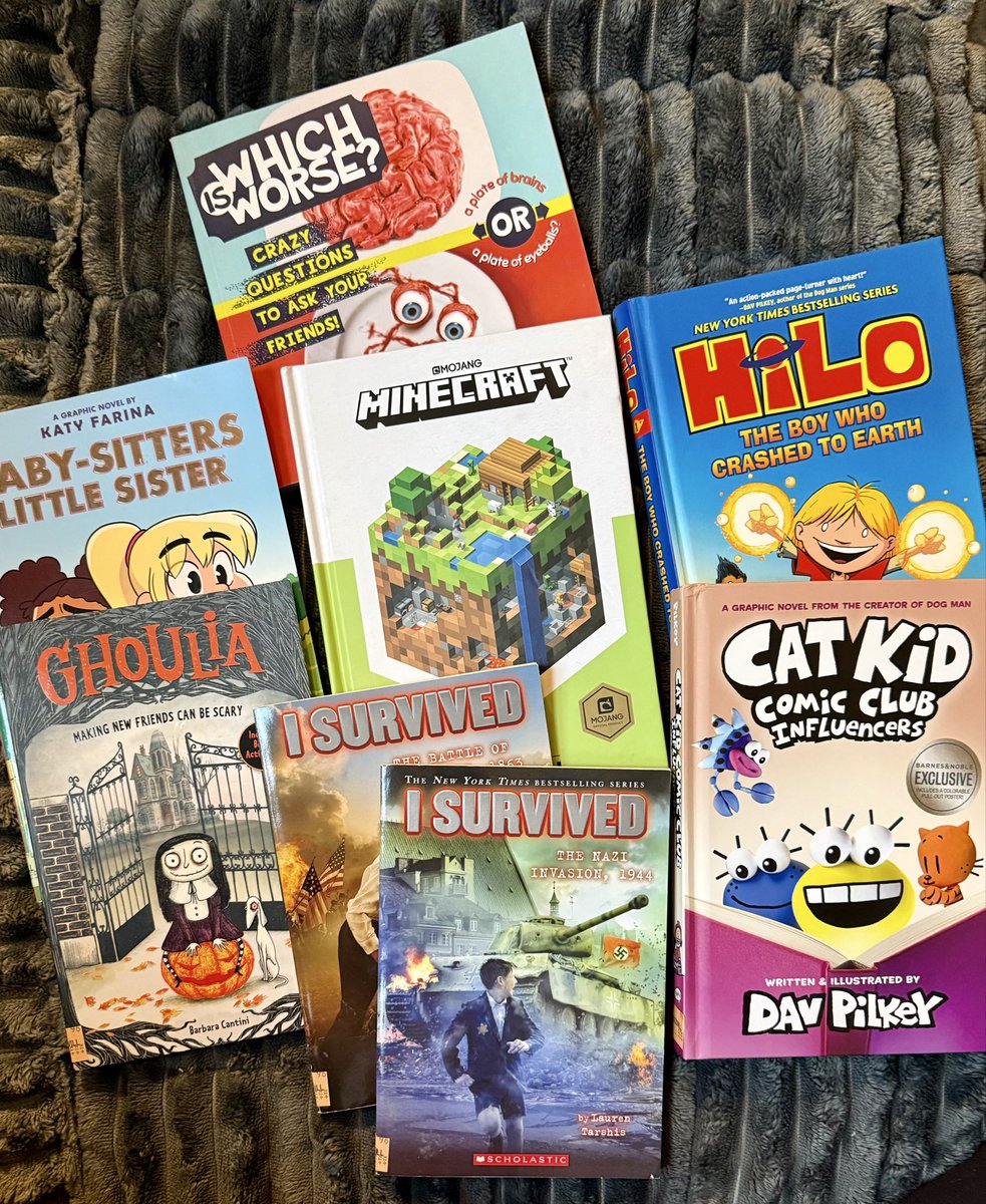 LoriTecler's tweet photo. Had to drop some things off at Goodwill today so I checked out the book collection. Picked up 8 books for $12. HiLo & Minecraft have been super popular this year & our copy of this Cat Kid book was lost long ago. #SchoolLibrary #Teachersof𝕏 https://t.co/VpGZzJzD8L
