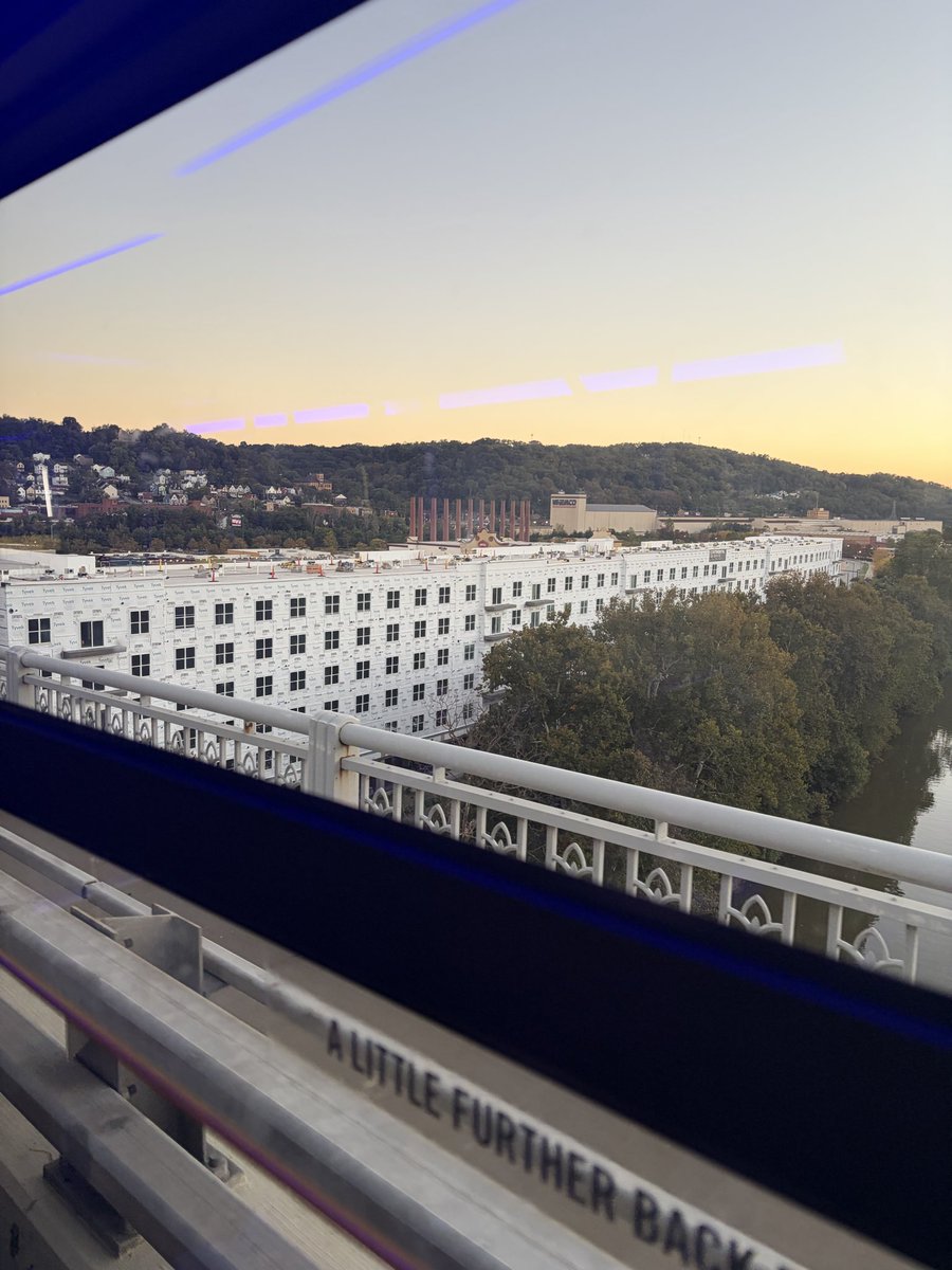 ABrunman's tweet photo. Ugly new construction is blocking what used to be one of my favorite Pittsburgh views, the AMC Waterfront coming across the bridge https://t.co/8xAsT4sC6q