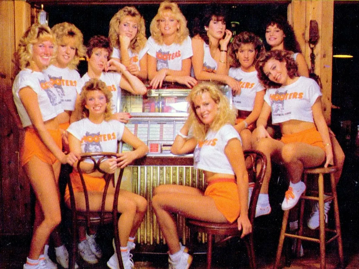 landofthe80s's tweet photo. On this date in 1983, the first Hooters restaurant opened in Clearwater, Florida. 

BITE-SIZED FACT | Six Clearwater businessmen with no previous restaurant experience opened the original location at 2800 Gulf-to-Bay Boulevard, where the restaurant still operates today. #80s #1980s #Nostalgia