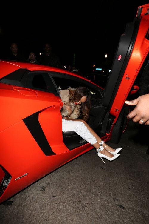 reininavy's tweet photo. riri with her red lamborghini aventador, 2013 https://t.co/03sz7hFUQn