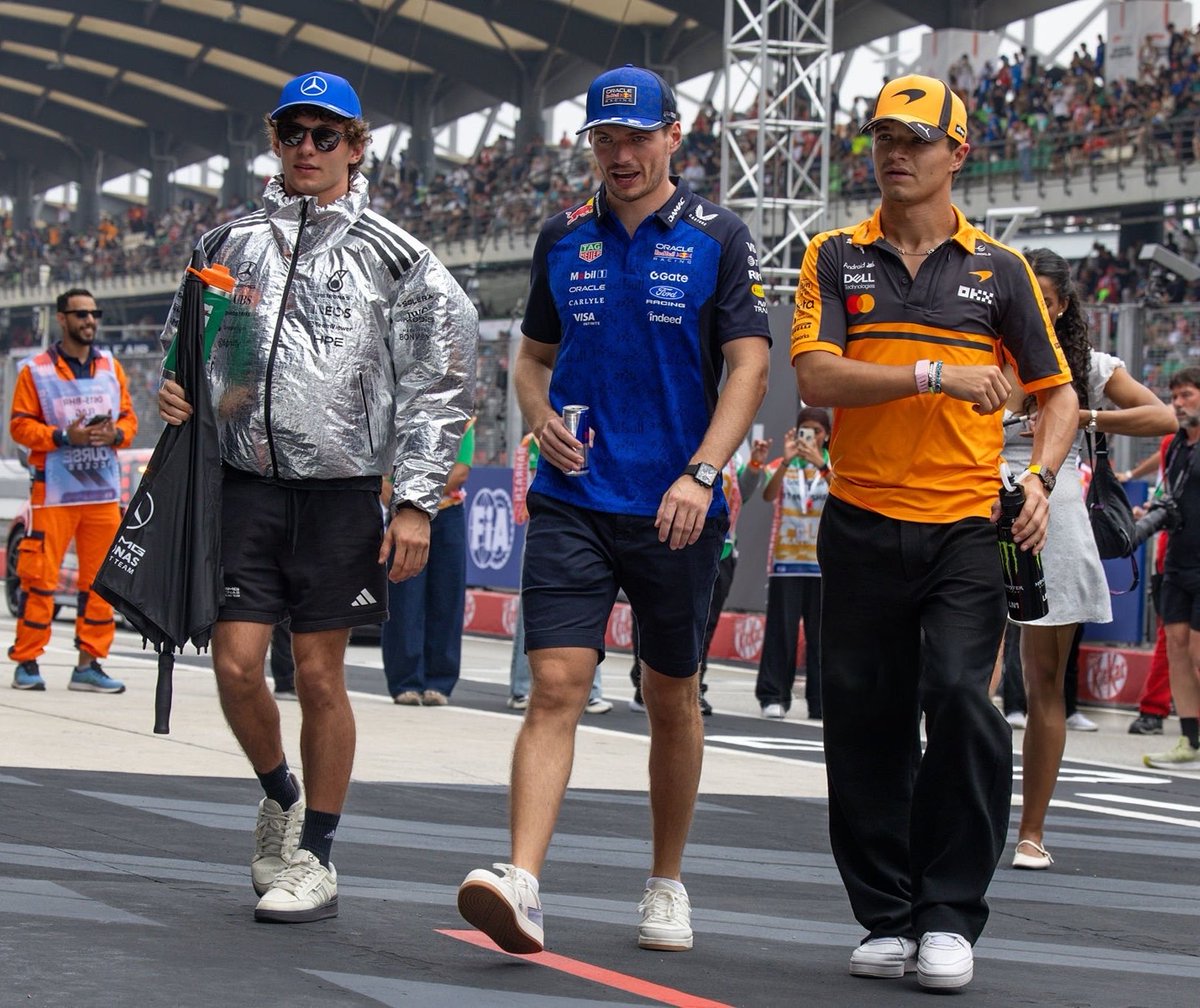 ln4norris's tweet photo. lando with max &amp; kimi after the parade https://t.co/LwpKAXxOqA