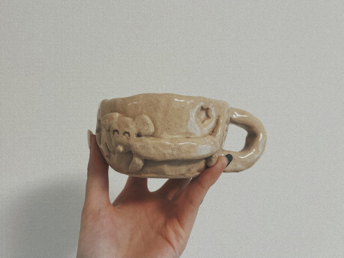 so__nm's tweet photo. そういえば大昔に陶芸体験で作ったマグカップ受け取った。いぬマグカップ。 https://t.co/fmf339gmiG