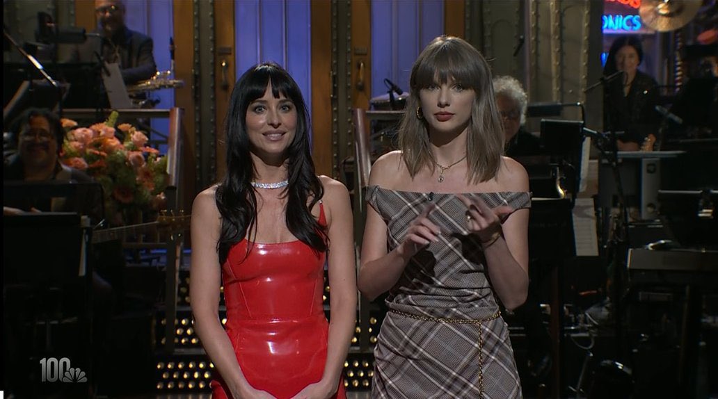 PopBase's tweet photo. Taylor Swift makes surprise appearance during Dakota Johnson’s monologue on SNL. https://t.co/kkMqCTLKFI