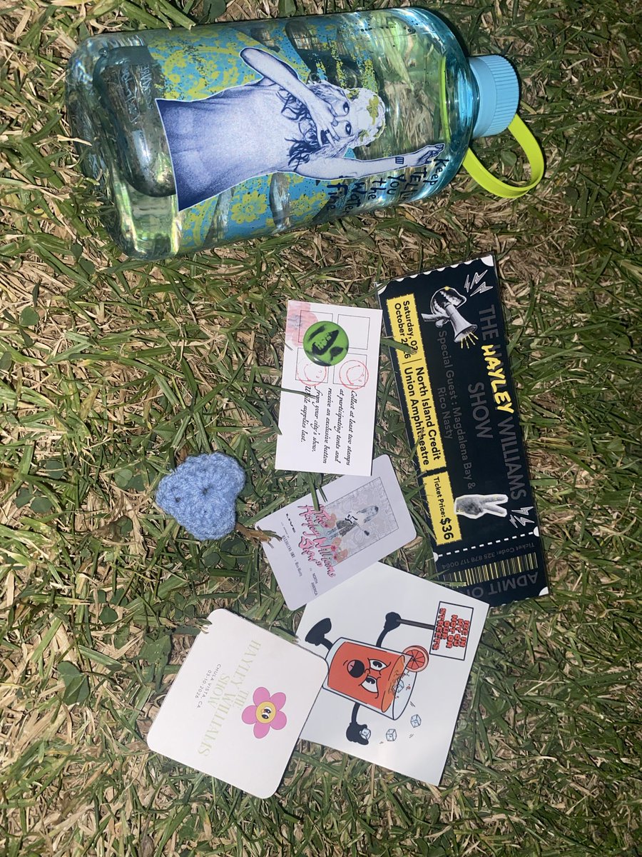 hashgender's tweet photo. donation water bottle + trinkets that were either given to me or traded for at the fan trading tent #thws >:-) https://t.co/vlslYbRglB