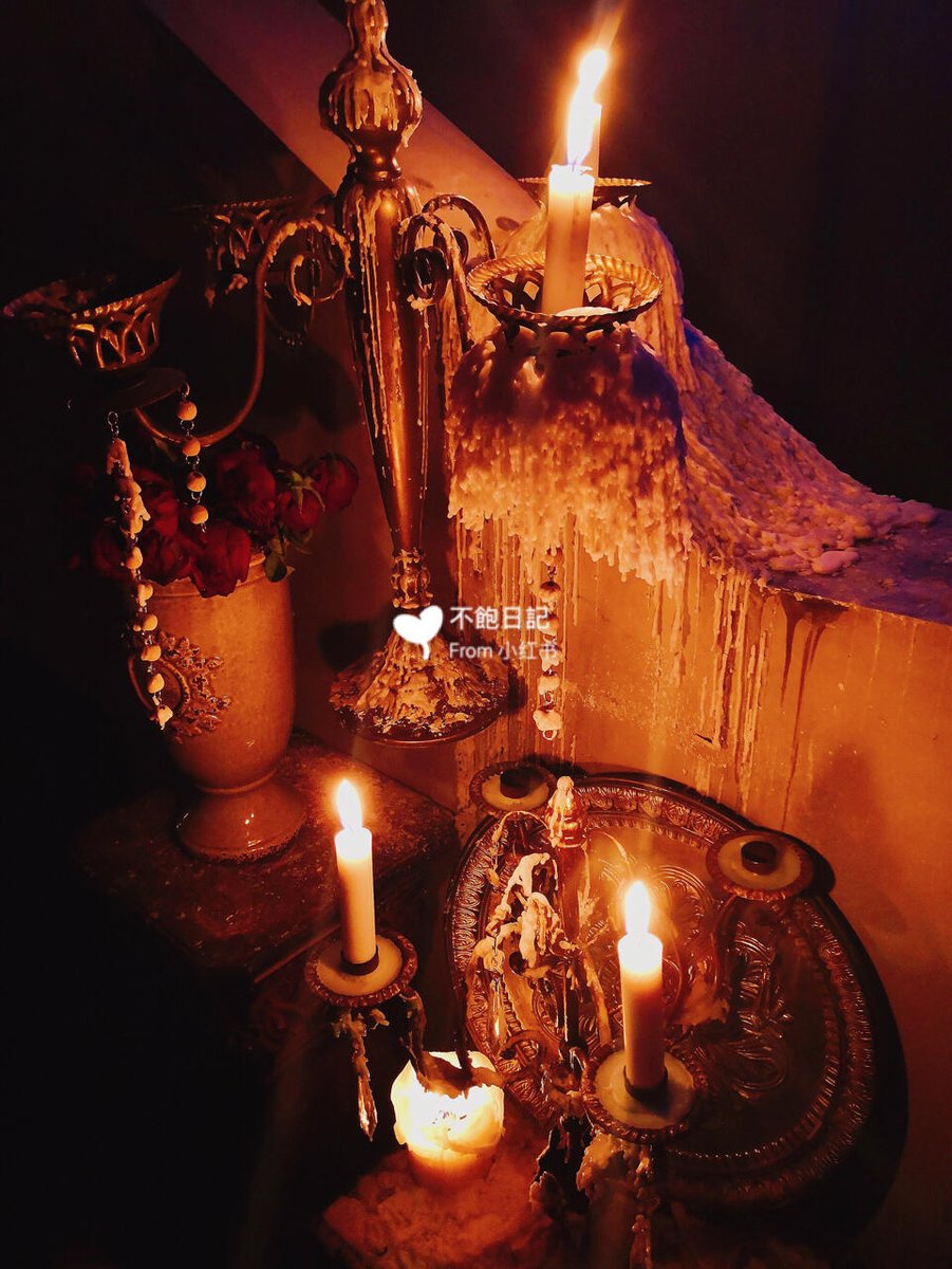 mopst926309's tweet photo. [In the dimly lit room, a worn cloth is used to tuck in a flickering candle placed beside a small pile of coal, bringing warm comfort to the quiet space.] https://t.co/wKIkVL3pM2