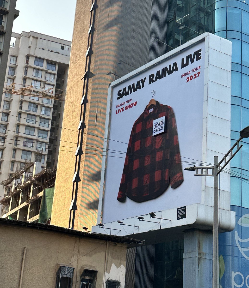 _indian_memes's tweet photo. Aura so GOATed, you know who’s performing just by looking at the shirt on the Billboard https://t.co/ZghfTCiUNU