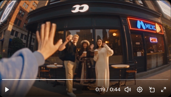 A YouTube video thumbnail showing a first-person perspective reaching out to wave at a group of people standing outside a 'Mexico' restaurant, at 0:19 of 0:44.
