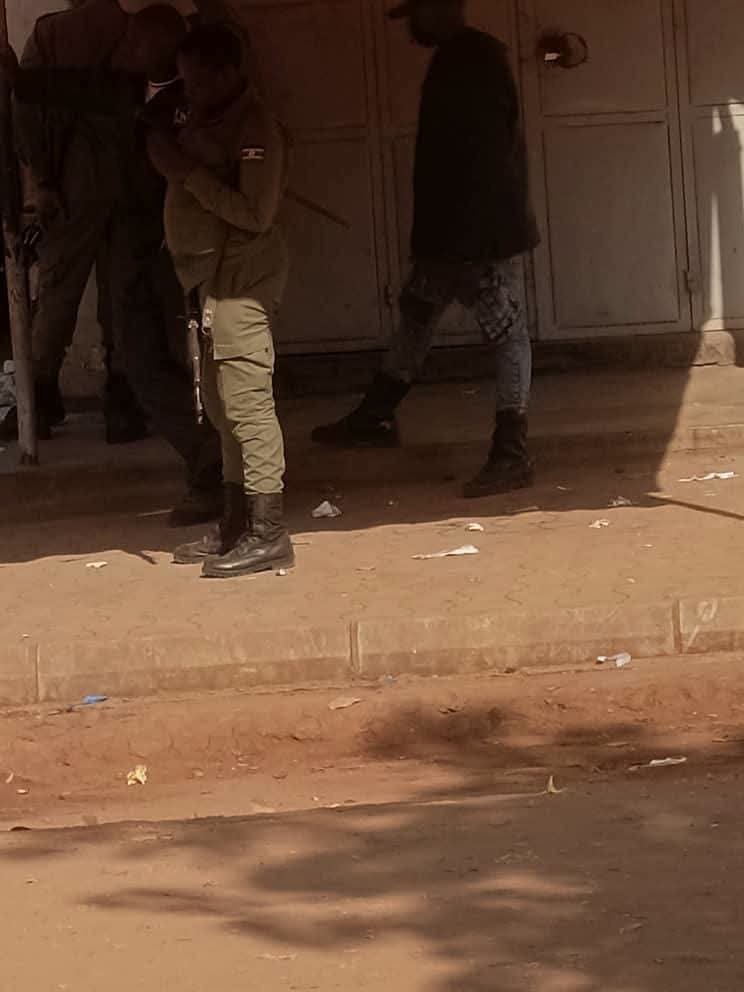 DavidLRubongoya's tweet photo. We've learnt of the arrest of our comrades Ayesiga Promise aka Mr. Nsi, Sarah Namutebi, MC Mose, councillor Sserunjoji, and others as they attended a Holy Mass at St. Francis of Assisi Catholic Church in Bulenga (Kikaaya). These comrades had gone to give thanks and dedicate special prayers for our leader @HEBobiwine as their way of marking #BobiWinesDay - a day designated by our mobilisation team to reignite the spirits of our supporters and encourage them to do good works. The leadership of the Church was aware of their presence and offered prayers. As the regime moves around doing their own mobilisation activities, some of which are outrightly illegal, they feel threatened even by @NUP_Ug supporters attending Church. Currently, the Church remains surrounded by police. We must all condemn the stinking double standards and demand for the release of our comrades.