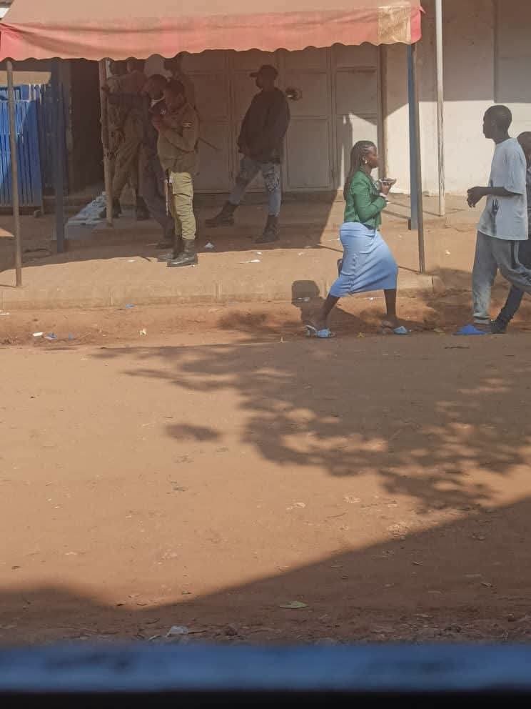 DavidLRubongoya's tweet photo. We've learnt of the arrest of our comrades Ayesiga Promise aka Mr. Nsi, Sarah Namutebi, MC Mose, councillor Sserunjoji, and others as they attended a Holy Mass at St. Francis of Assisi Catholic Church in Bulenga (Kikaaya). These comrades had gone to give thanks and dedicate special prayers for our leader @HEBobiwine as their way of marking #BobiWinesDay - a day designated by our mobilisation team to reignite the spirits of our supporters and encourage them to do good works. The leadership of the Church was aware of their presence and offered prayers. As the regime moves around doing their own mobilisation activities, some of which are outrightly illegal, they feel threatened even by @NUP_Ug supporters attending Church. Currently, the Church remains surrounded by police. We must all condemn the stinking double standards and demand for the release of our comrades.