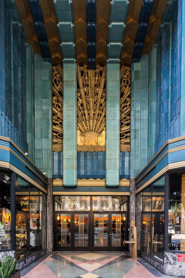 gietzschean's tweet photo. The ornate Art Deco entrance of the Eastern Columbia Building located in Downtown Los Angeles.

Designed in 1930 by Claud Beelman, its timeless beauty is evident in the Turquoise terracotta tiles with rich blue and gold-leaf details above the glass double doors. https://t.co/ZwZ0EL9AvU