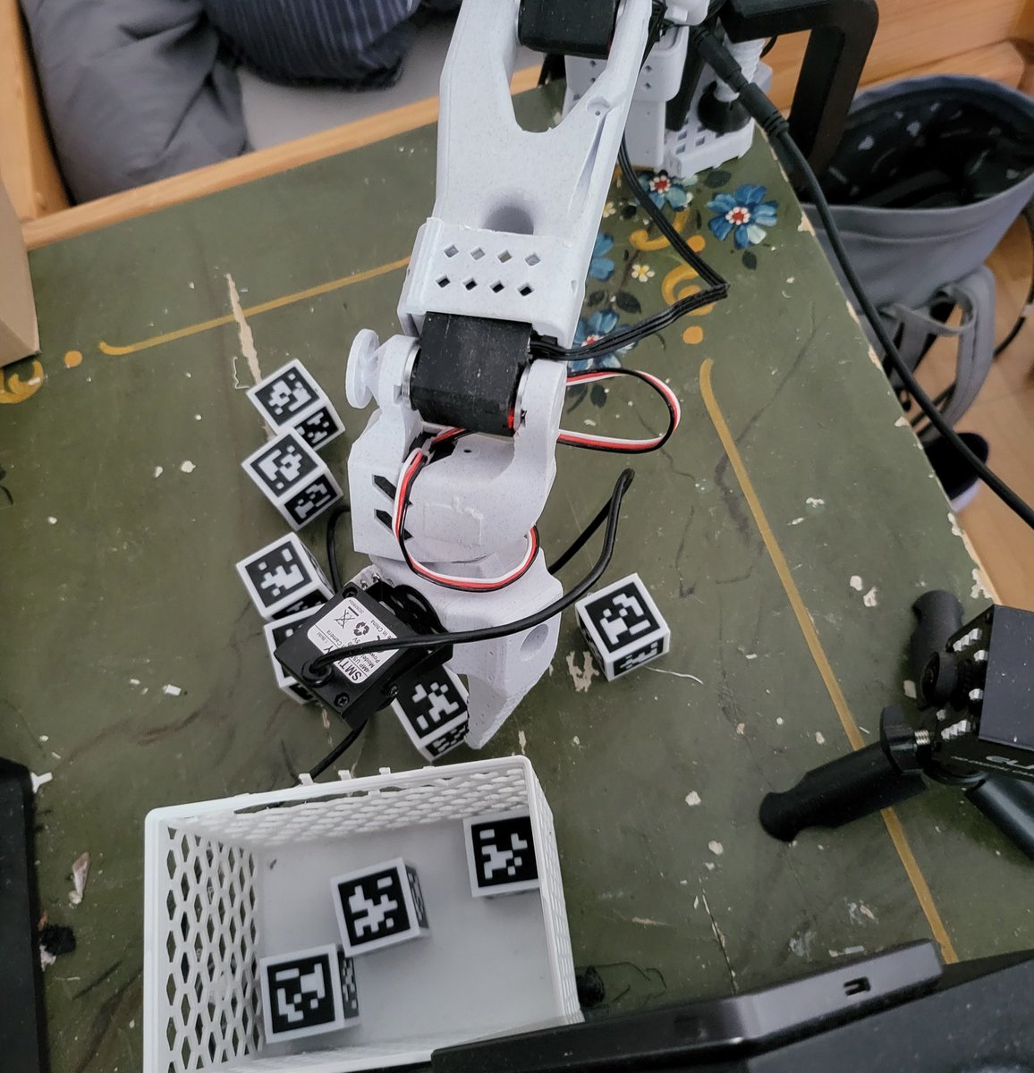 tom_doerr's tweet photo. I like how much grit GPT-6 has. It's been working on placing all cubes in the box for 16h without pausing https://t.co/QSbqUmDMAd
