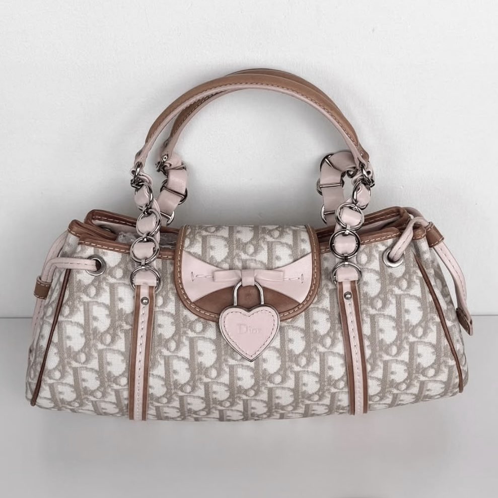 glirttery's tweet photo. 2000s christian dior ‘romantique’ trotter bag https://t.co/0Oni2dkXYY