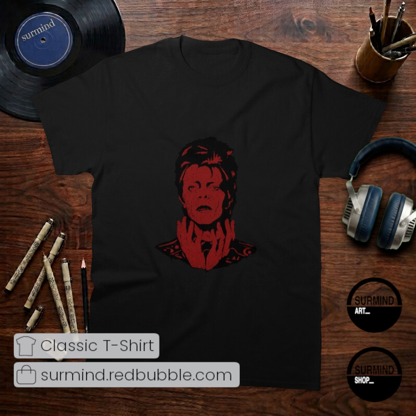 surmindshop's tweet photo. Turn and face the strange... ⚡️✨

Channel timeless icon energy with this David Bowie graphic tee. Features a striking red distressed portrait on a black classic fit.

Shop: https://t.co/1t1KxuaMGe

#DavidBowie #GlamRock #ArtRock #RockIcon #Redbubble #Surmind https://t.co/RVhcn9gPED