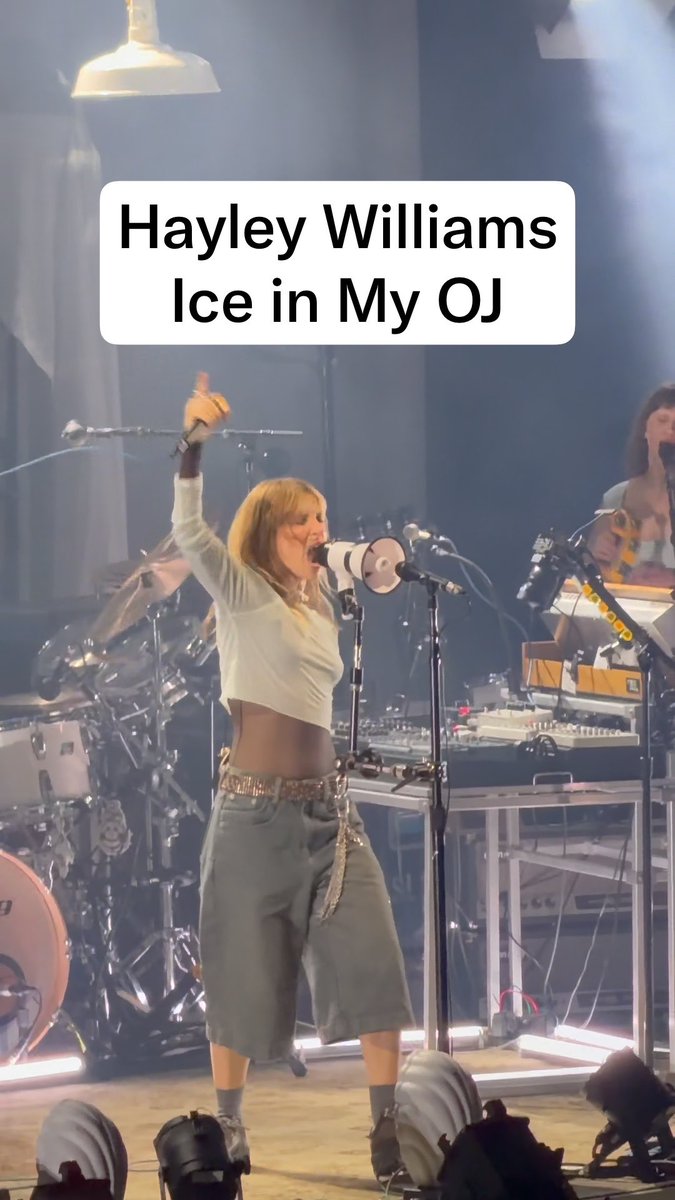 A concert photo shows a performer on stage singing into a megaphone microphone, labeled with text reading 'Hayley Williams Ice in My OJ'.