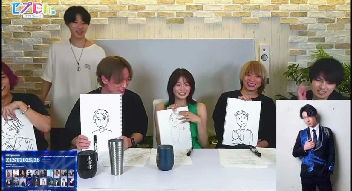 A group of people sit at a table holding up sketch drawings of a man in a suit, with a reference photo of the same man in a blue and black ensemble shown on the right; on-screen text reads 'ピヂ Ch. PITCH Channel' and 'ZEST 2025/26 2024.8.8 SAT Shibuya WWW, DOCUMENT ExChannel'.