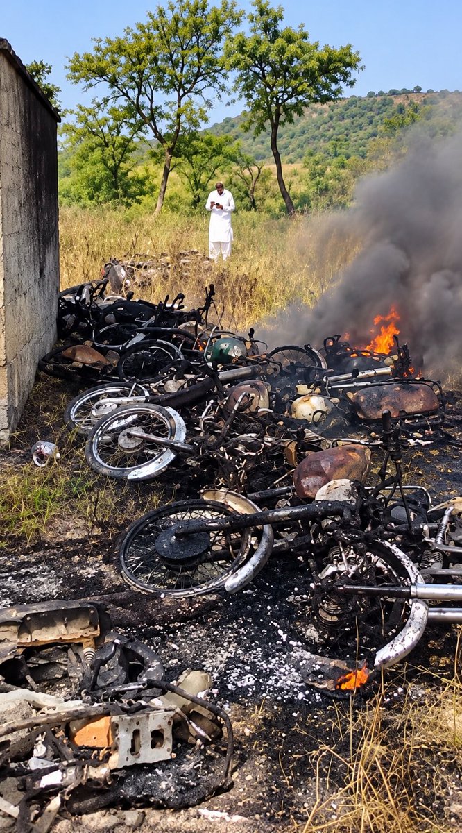 NawazKashur's tweet photo. Pakistani forces reportedly set motorcycles on fire in Dadyal, Jammu &amp; Kashmir, following clashes with protesters.

#Dadyal #JammuKashmir #Kashmir #POJK https://t.co/KOVC9GP4o6