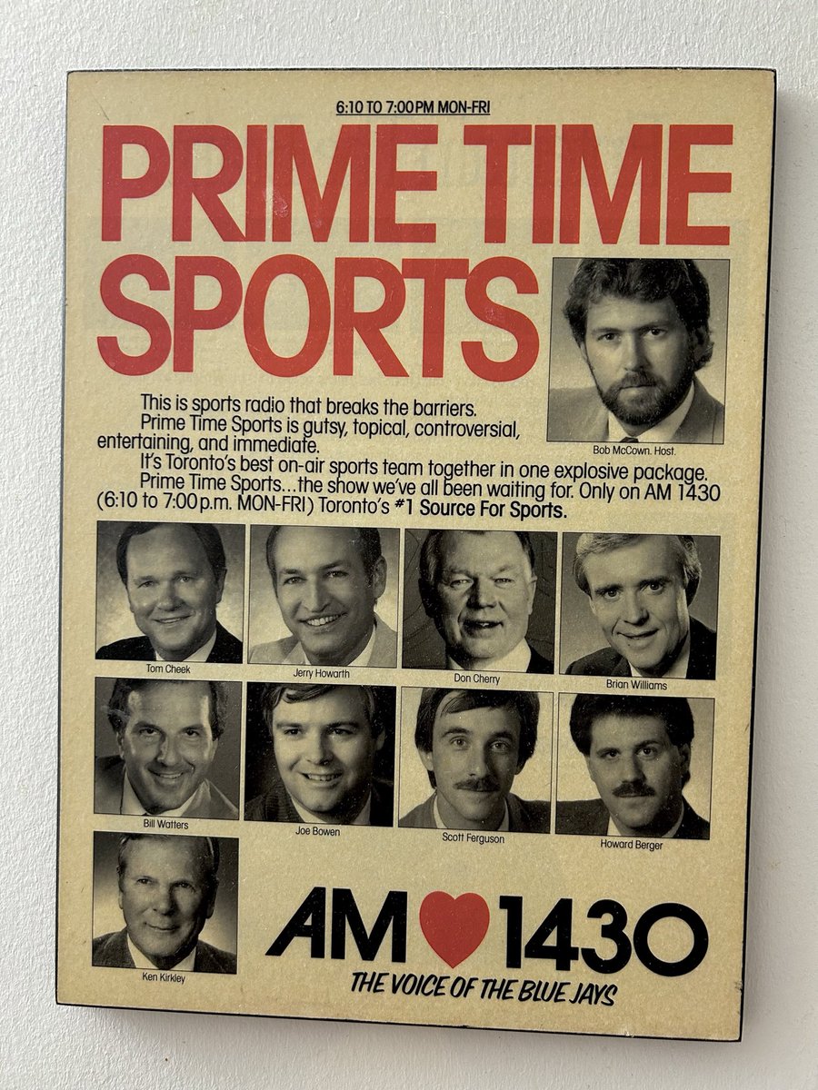 Berger_BYTES's tweet photo. Still hanging in my condo. We began Prime Time Sports 37 years ago this week - Oct. 2, 1989. Bob McCown and Bill Watters in studio with yours truly producing the 50-minute show… which grew into a three-hour colossus on radio and TV until #Rogers pulled the plug in June 2019. I was in marvellous company in his newspaper ad.😊And, we were all so young.😱 #radio #sportsradio #Toronto #BlueJays #Leafs #LeafsForever